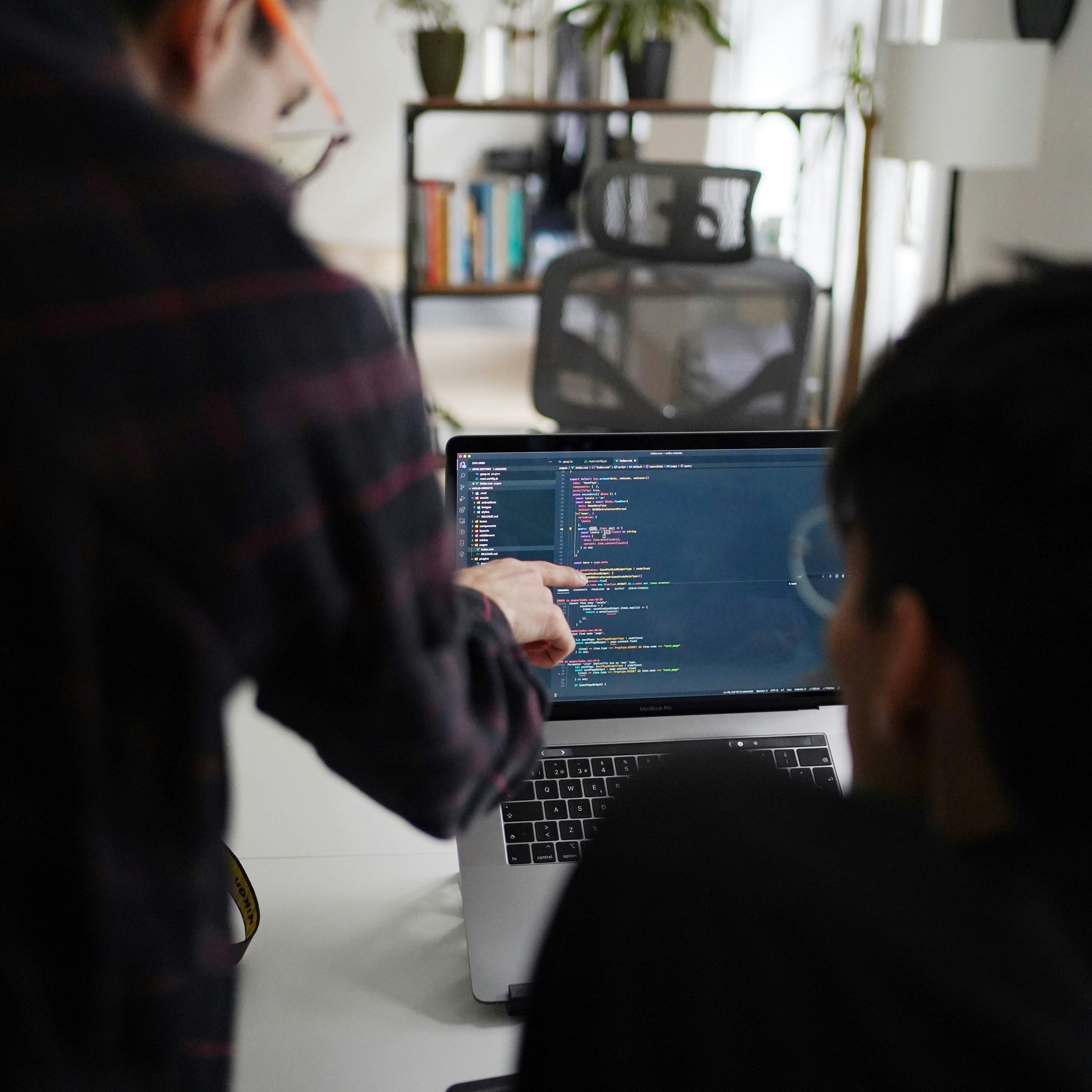 Developers reviewing code together